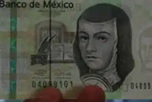 como-detectar-billetes-falsos-y-fraudes-en-efectivo-guia-practica-y-consejos-clave